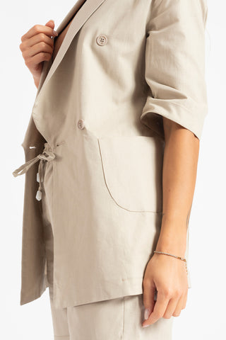 Double-breasted jacket and shorts suit in taupe linen