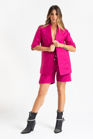 Double-breasted jacket and shorts suit in fuchsia linen