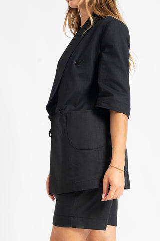 Double-breasted jacket and shorts suit in black linen