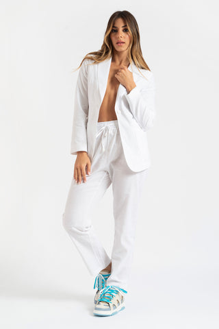 Tailleur giacca e pantaloni in lino bianco