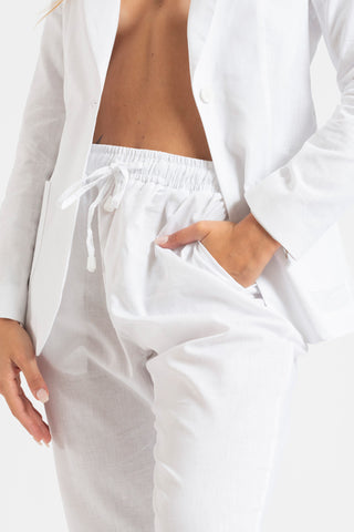 Tailleur giacca e pantaloni in lino bianco