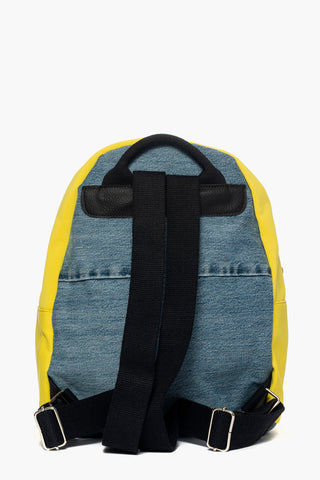 Mochila en tejido jeans y lycra amarilla con tachuelas