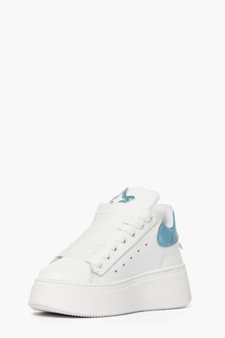 White leather sneakers with light blue inserts with Santiago Lux accessories